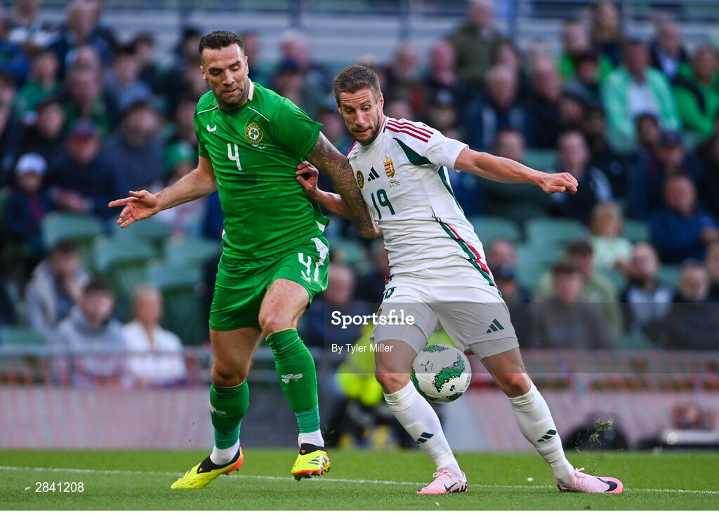4 June 2024; Barnabás Varga of Hungary in action against Shane Duffy of Republic of Ireland during the international friendly match between Republic of Ireland and Hungary at Aviva Stadium in Dublin. Photo by Tyler Miller/Sportsfile