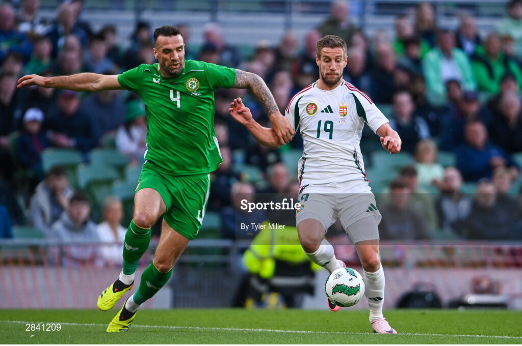 4 June 2024; Barnabás Varga of Hungary in action against Shane Duffy of Republic of Ireland during the international friendly match between Republic of Ireland and Hungary at Aviva Stadium in Dublin. Photo by Tyler Miller/Sportsfile