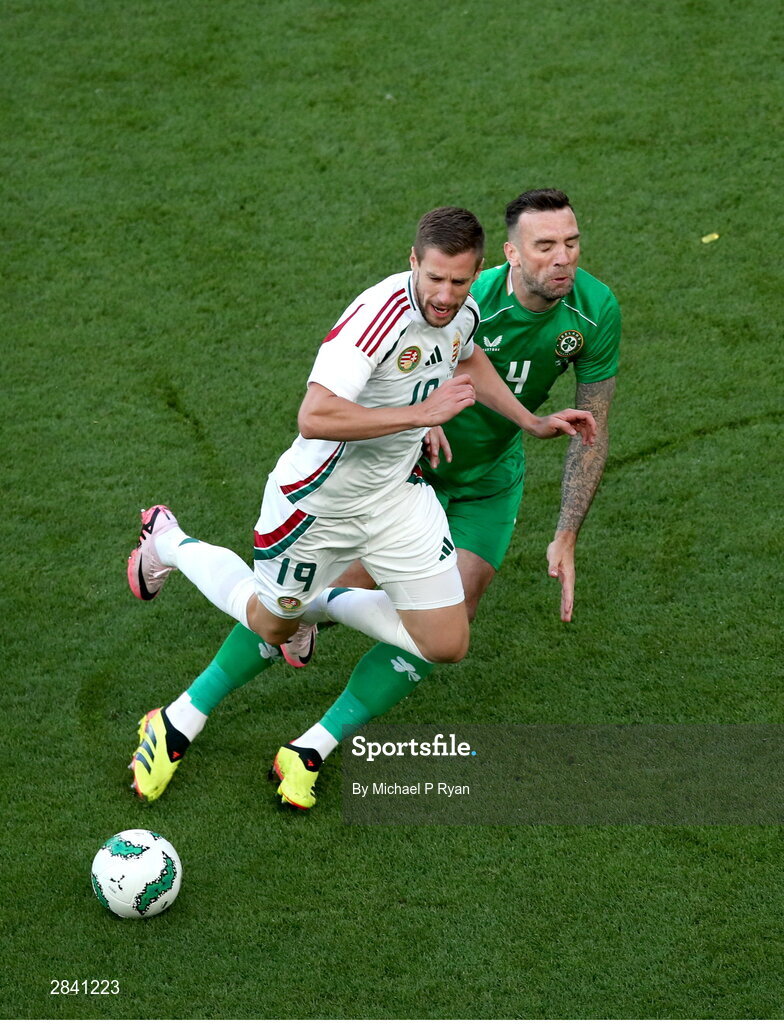 4 June 2024; Shane Duffy of Republic of Ireland in action against Barnabás Varga of Hungary during the international friendly match between Republic of Ireland and Hungary at Aviva Stadium in Dublin. Photo by Michael P Ryan/Sportsfile
