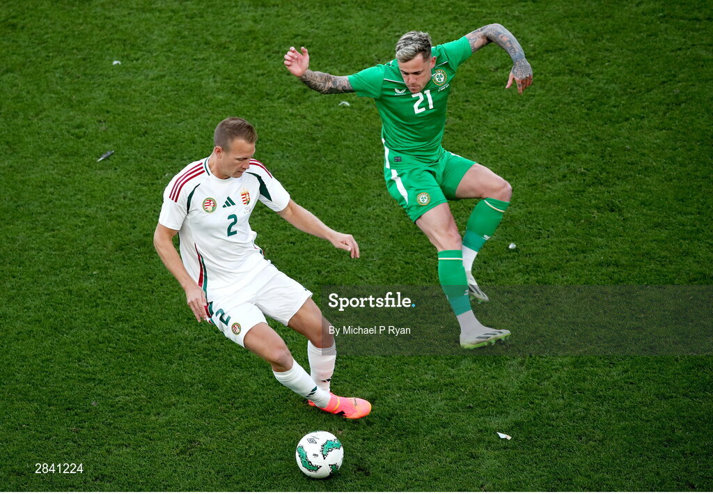 4 June 2024; Ádám Lang of Hungary in action against Sammie Szmodics of Republic of Ireland during the international friendly match between Republic of Ireland and Hungary at Aviva Stadium in Dublin. Photo by Michael P Ryan/Sportsfile