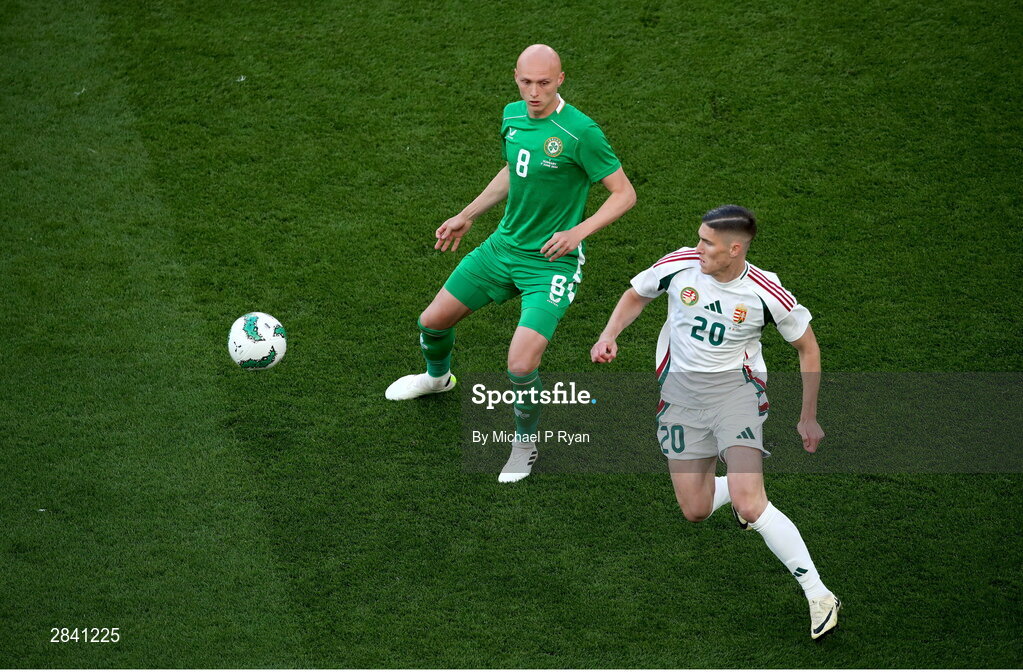 4 June 2024; Will Smallbone of Republic of Ireland in action against Roland Sallai of Hungary during the international friendly match between Republic of Ireland and Hungary at Aviva Stadium in Dublin. Photo by Michael P Ryan/Sportsfile