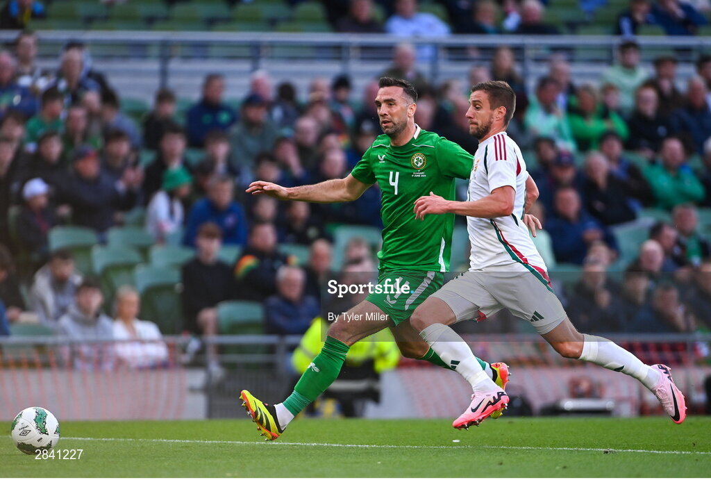 4 June 2024; Barnabás Varga of Hungary in action against Shane Duffy of Republic of Ireland during the international friendly match between Republic of Ireland and Hungary at Aviva Stadium in Dublin. Photo by Tyler Miller/Sportsfile