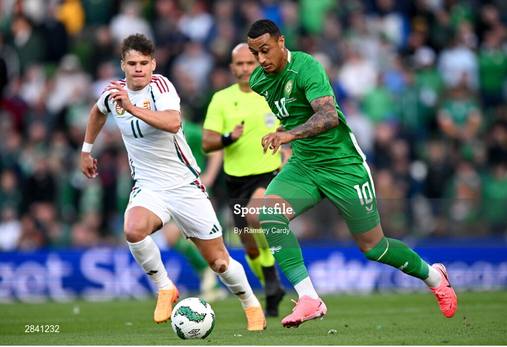 4 June 2024; Adam Idah of Republic of Ireland in action against Milos Kerkez of Hungary during the international friendly match between Republic of Ireland and Hungary at Aviva Stadium in Dublin. Photo by Ramsey Cardy/Sportsfile