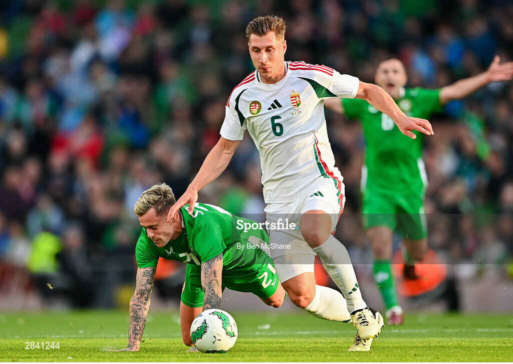 4 June 2024; Sammie Szmodics of Republic of Ireland in action against Willi Orbán of Hungary during the international friendly match between Republic of Ireland and Hungary at Aviva Stadium in Dublin. Photo by Ben McShane/Sportsfile