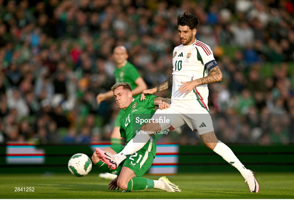 4 June 2024; Dominik Szoboszlai of Hungary in action against Sammie Szmodics of Republic of Ireland during the international friendly match between Republic of Ireland and Hungary at Aviva Stadium in Dublin. Photo by Ramsey Cardy/Sportsfile