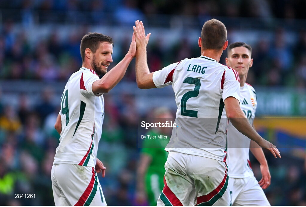 4 June 2024; Ádám Lang of Hungary, right, celebrates with teammate Barnabás Varga after scoring his side's first goal during the international friendly match between Republic of Ireland and Hungary at Aviva Stadium in Dublin. Photo by Tyler Miller/Sportsfile