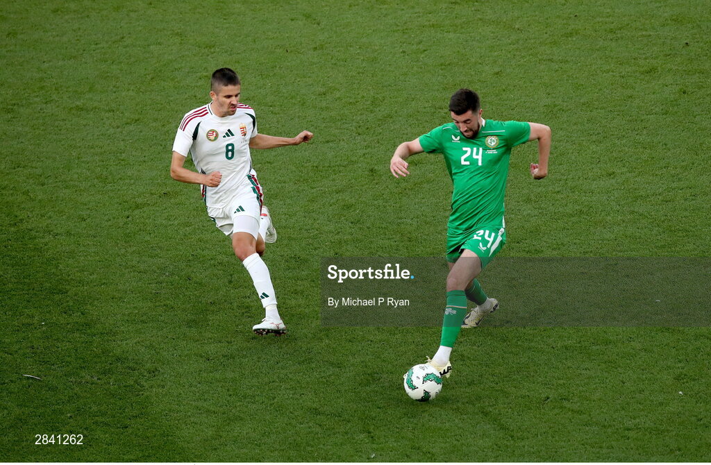 4 June 2024; Finn Azaz of Republic of Ireland in action against Ádám Nagy of Hungary during the international friendly match between Republic of Ireland and Hungary at Aviva Stadium in Dublin. Photo by Michael P Ryan/Sportsfile