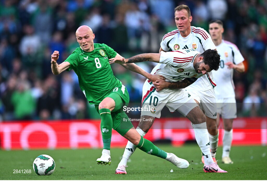 4 June 2024; Will Smallbone of Republic of Ireland in action against Dominik Szoboszlai of Hungary during the international friendly match between Republic of Ireland and Hungary at Aviva Stadium in Dublin. Photo by Ramsey Cardy/Sportsfile