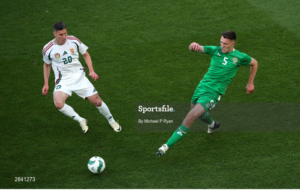 4 June 2024; Dara O'Shea of Republic of Ireland in action against Roland Sallai of Hungary during the international friendly match between Republic of Ireland and Hungary at Aviva Stadium in Dublin. Photo by Michael P Ryan/Sportsfile