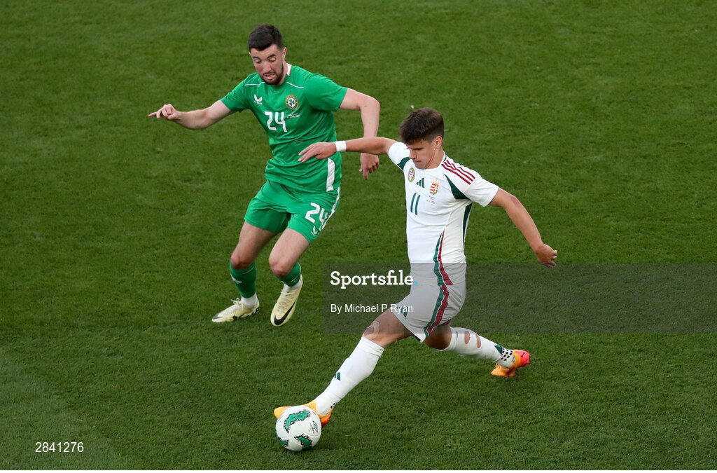 4 June 2024; Milos Kerkez of Hungary in action against Finn Azaz of Republic of Ireland during the international friendly match between Republic of Ireland and Hungary at Aviva Stadium in Dublin. Photo by Michael P Ryan/Sportsfile
