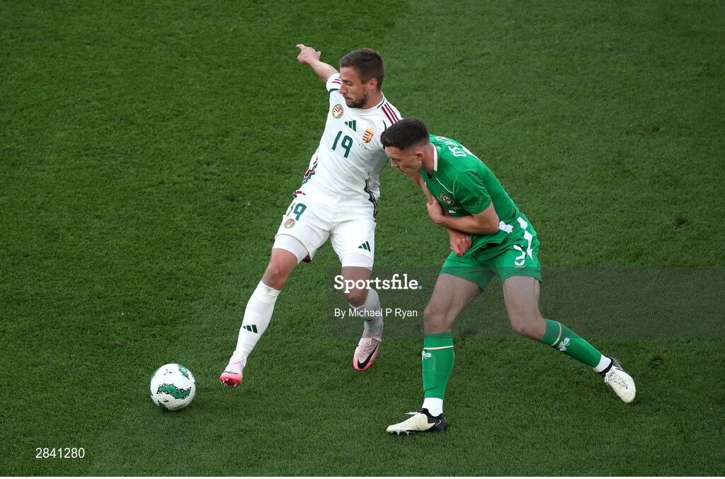 4 June 2024; Barnabás Varga of Hungary in action against Dara O'Shea of Republic of Ireland during the international friendly match between Republic of Ireland and Hungary at Aviva Stadium in Dublin. Photo by Michael P Ryan/Sportsfile