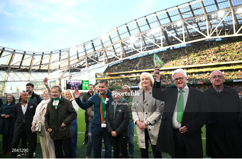 4 June 2024; Members of the families of the Republic of Ireland team that played in the 1924 Olympic Games, the first men's international fixtures, on the pitch at half-time of the international friendly match between Republic of Ireland and Hungary at Aviva Stadium in Dublin. Photo by Ramsey Cardy/Sportsfile