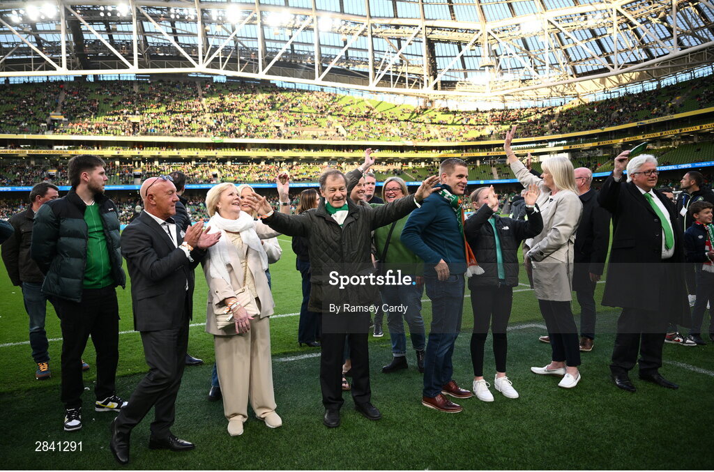 4 June 2024; Members of the families of the Republic of Ireland team that played in the 1924 Olympic Games, the first men's international fixtures, on the pitch at half-time of the international friendly match between Republic of Ireland and Hungary at Aviva Stadium in Dublin. Photo by Ramsey Cardy/Sportsfile
