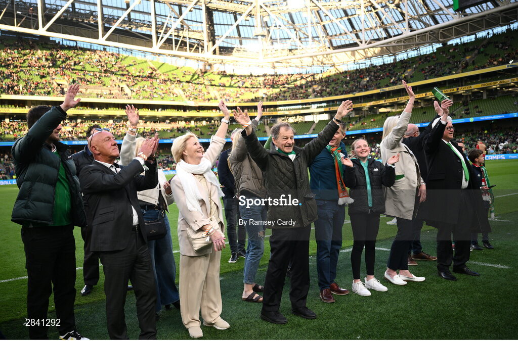 4 June 2024; Members of the families of the Republic of Ireland team that played in the 1924 Olympic Games, the first men's international fixtures, on the pitch at half-time of the international friendly match between Republic of Ireland and Hungary at Aviva Stadium in Dublin. Photo by Ramsey Cardy/Sportsfile