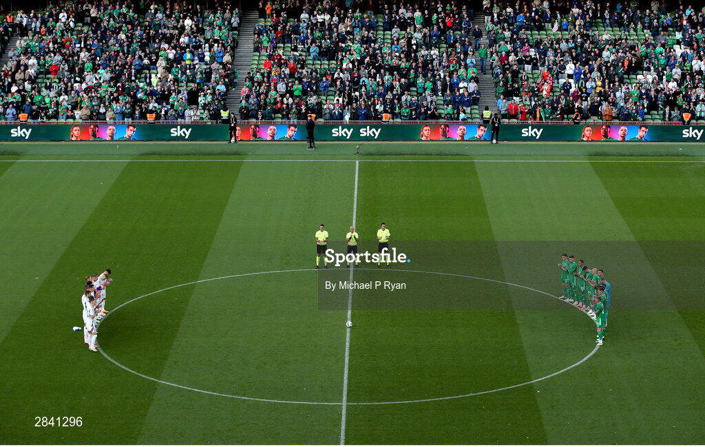 4 June 2024; Republic of Ireland players, Hungary players and officials observe a moments applause for the late former Republic of Ireland internationals Joe Kinnear and Charlie Hurley before the international friendly match between Republic of Ireland and Hungary at Aviva Stadium in Dublin before the international friendly match between Republic of Ireland and Hungary at Aviva Stadium in Dublin. Photo by Michael P Ryan/Sportsfile