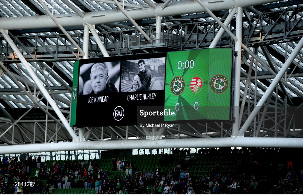 4 June 2024; Images of the late former Republic of Ireland internationals Joe Kinnear and Charlie Hurley are seen on the big screen before the international friendly match between Republic of Ireland and Hungary at Aviva Stadium in Dublin. Photo by Michael P Ryan/Sportsfile