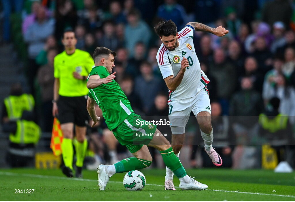 4 June 2024; Dominik Szoboszlai of Hungary in action against Jason Knight of Republic of Ireland during the international friendly match between Republic of Ireland and Hungary at Aviva Stadium in Dublin. Photo by Ben McShane/Sportsfile