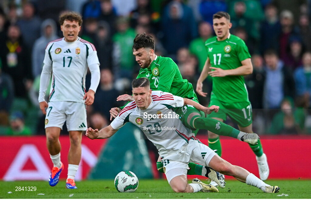 4 June 2024; Troy Parrott of Republic of Ireland in action against Roland Sallai of Hungary during the international friendly match between Republic of Ireland and Hungary at Aviva Stadium in Dublin. Photo by Ben McShane/Sportsfile