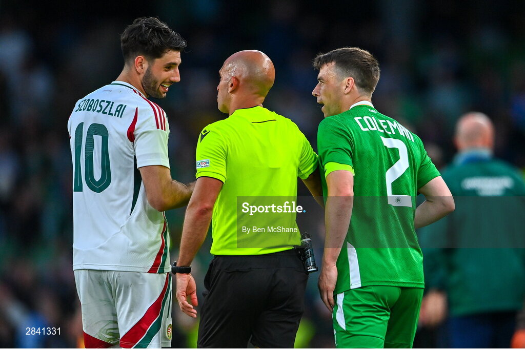 4 June 2024; Referee Luis Godinho converses with Dominik Szoboszlai of Hungary and Seamus Coleman of Republic of Ireland during the international friendly match between Republic of Ireland and Hungary at Aviva Stadium in Dublin. Photo by Ben McShane/Sportsfile