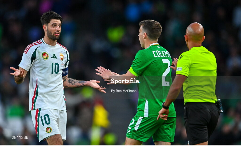 4 June 2024; Dominik Szoboszlai of Hungary converses with Seamus Coleman of Republic of Ireland during the international friendly match between Republic of Ireland and Hungary at Aviva Stadium in Dublin. Photo by Ben McShane/Sportsfile