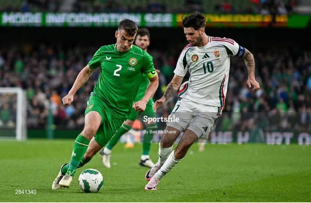 4 June 2024; Seamus Coleman of Republic of Ireland in action against Dominik Szoboszlai of Hungary during the international friendly match between Republic of Ireland and Hungary at Aviva Stadium in Dublin. Photo by Ben McShane/Sportsfile