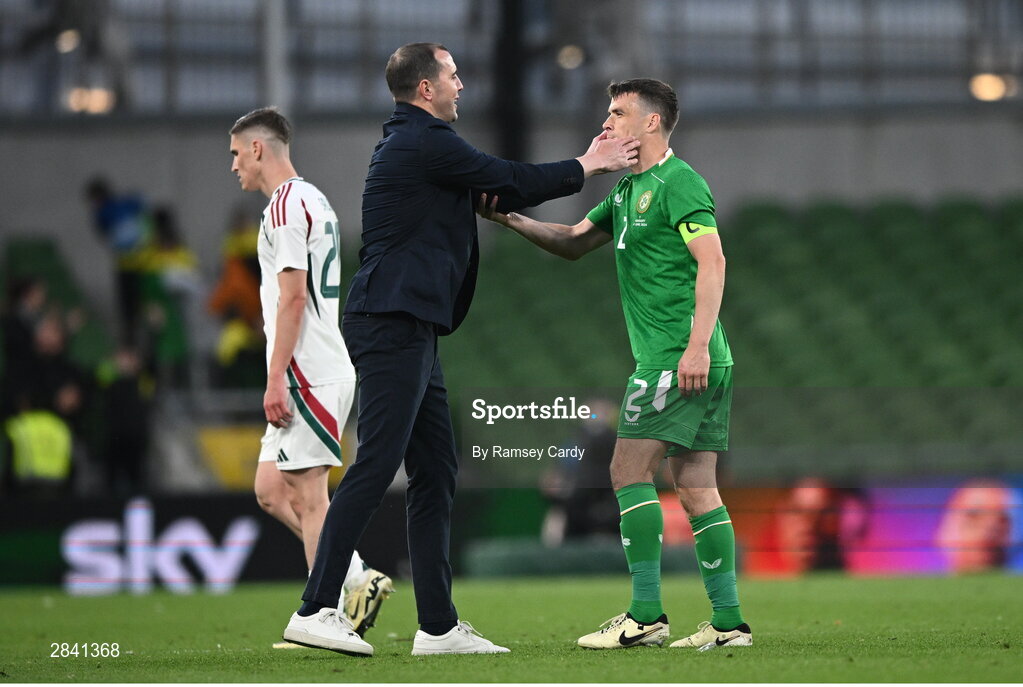 4 June 2024; Republic of Ireland interim head coach John O'Shea and Seamus Coleman of Republic of Ireland after their side's victory in the international friendly match between Republic of Ireland and Hungary at Aviva Stadium in Dublin. Photo by Ramsey Cardy/Sportsfile