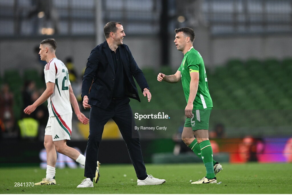 4 June 2024; Republic of Ireland interim head coach John O'Shea and Seamus Coleman of Republic of Ireland after their side's victory in the international friendly match between Republic of Ireland and Hungary at Aviva Stadium in Dublin. Photo by Ramsey Cardy/Sportsfile