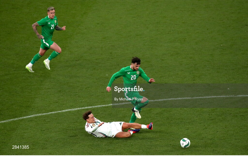 4 June 2024; Troy Parrott of Republic of Ireland is tackled by Callum Styles of Hungary during the international friendly match between Republic of Ireland and Hungary at Aviva Stadium in Dublin. Photo by Michael P Ryan/Sportsfile