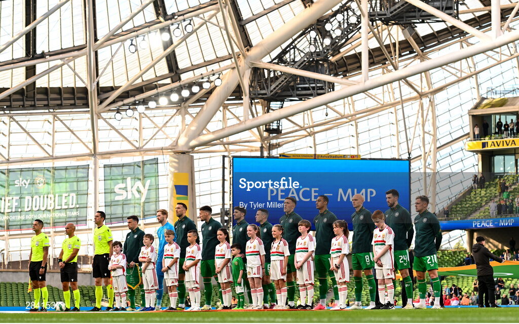 4 June 2024; Republic of Ireland players stand for the playing of the national anthems before the international friendly match between Republic of Ireland and Hungary at Aviva Stadium in Dublin. Photo by Tyler Miller/Sportsfile