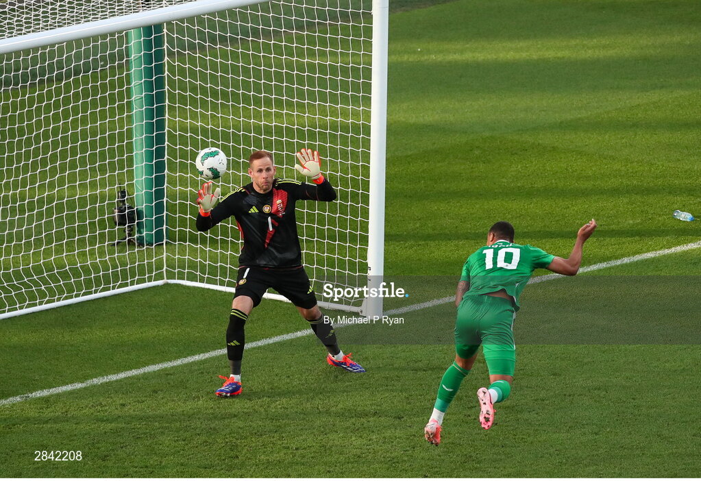 4 June 2024; Adam Idah of Republic of Ireland heads to score his side's first goal during the international friendly match between Republic of Ireland and Hungary at Aviva Stadium in Dublin. Photo by Michael P Ryan/Sportsfile
