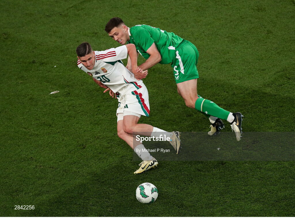 4 June 2024; Roland Sallai of Hungary in action against Dara O'Shea of Republic of Ireland during the international friendly match between Republic of Ireland and Hungary at Aviva Stadium in Dublin. Photo by Michael P Ryan/Sportsfile