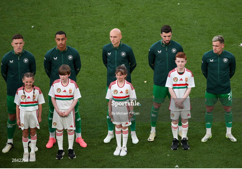 4 June 2024; Republic of Ireland players, from left, Dara O'Shea, Adam Idah, Will Smallbone, Finn Azaz, and Sammie Szmodics with mascots before the international friendly match between Republic of Ireland and Hungary at Aviva Stadium in Dublin. Photo by Michael P Ryan/Sportsfile