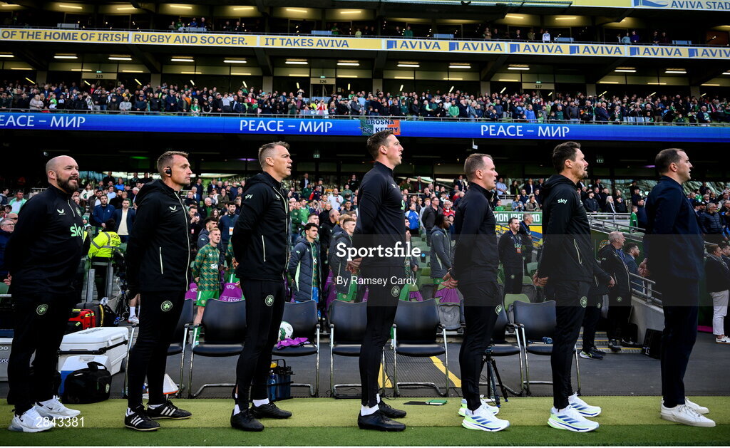 4 June 2024; Republic of Ireland staff, from left, Kit and equipment manager Karl McKenna, Lead physiotherapist Danny Miller, head of athletic performance Damien Doyle, goalkeeping coach Rene Gilmartin, assistant coach Glenn Whelan, assistant coach Paddy McCarthy and  interim head coach John O'Shea before the international friendly match between Republic of Ireland and Hungary at Aviva Stadium in Dublin. Photo by Ramsey Cardy/Sportsfile