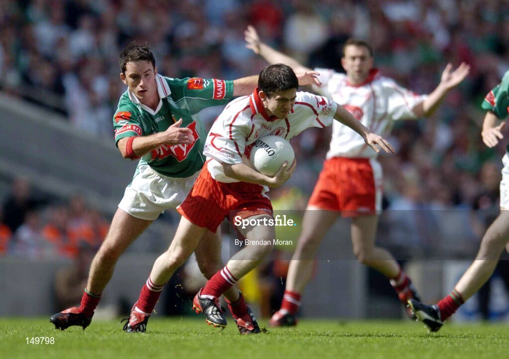 7 August 2004; Mark Harte, Tyrone, in action against Conor Moran, Mayo. Bank of Ireland All-Ireland Senior Football Championship Quarter Final, Mayo v Tyrone, Croke Park, Dublin. Picture credit; Brendan Moran / SPORTSFILE
