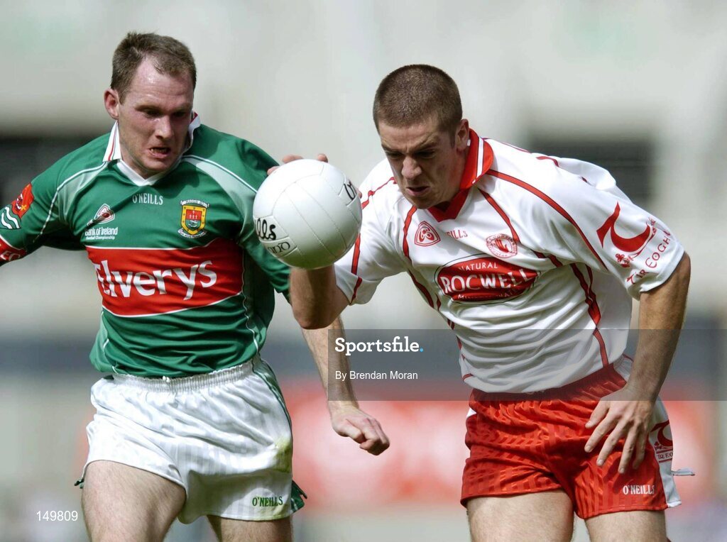 7 August 2004; Philip Jordan, Tyrone, in action against Fergal Costello, Mayo. Bank of Ireland All-Ireland Senior Football Championship Quarter Final, Mayo v Tyrone, Croke Park, Dublin. Picture credit; Brendan Moran / SPORTSFILE
