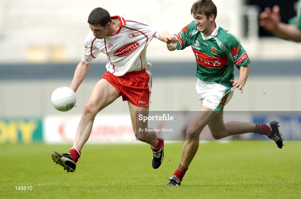 7 August 2004; Sean Cavanagh, Tyrone, in action against Ronan McGarrity, Mayo. Bank of Ireland All-Ireland Senior Football Championship Quarter Final, Mayo v Tyrone, Croke Park, Dublin. Picture credit; Brendan Moran / SPORTSFILE
