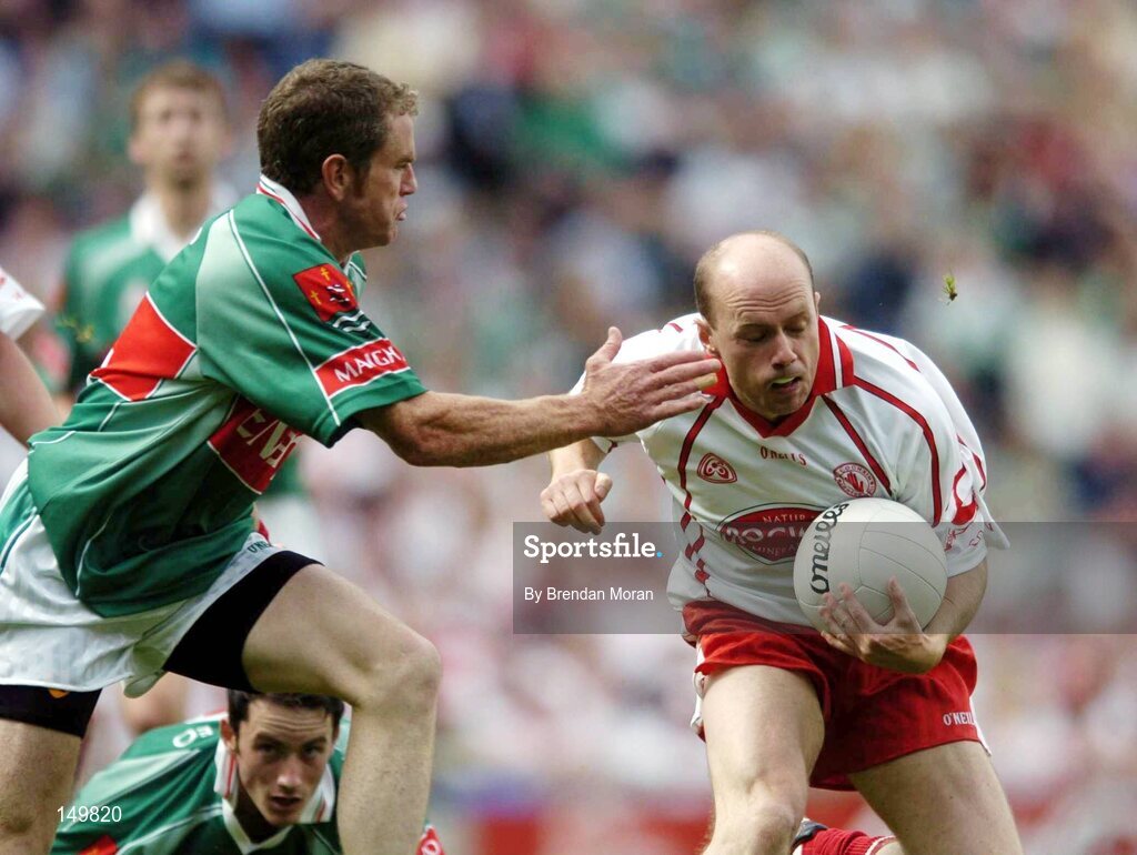 7 August 2004; Peter Canavan, Tyrone, in action against Gary Ruane, Mayo. Bank of Ireland All-Ireland Senior Football Championship Quarter Final, Mayo v Tyrone, Croke Park, Dublin. Picture credit; Brendan Moran / SPORTSFILE