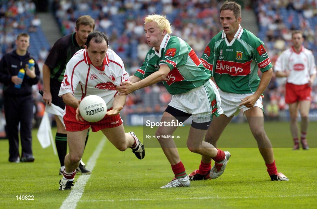7 August 2004; Brian Dooher, Tyrone, in action against Conor Mortimer, Mayo. Bank of Ireland All-Ireland Senior Football Championship Quarter Final, Mayo v Tyrone, Croke Park, Dublin. Picture credit; Ray McManus / SPORTSFILE
