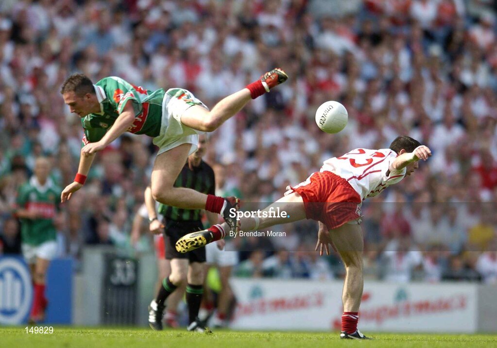 7 August 2004; Ciaran Gourley, Tyrone, in action against Alan Dillon, Mayo. Bank of Ireland All-Ireland Senior Football Championship Quarter Final, Mayo v Tyrone, Croke Park, Dublin. Picture credit; Brendan Moran / SPORTSFILE
