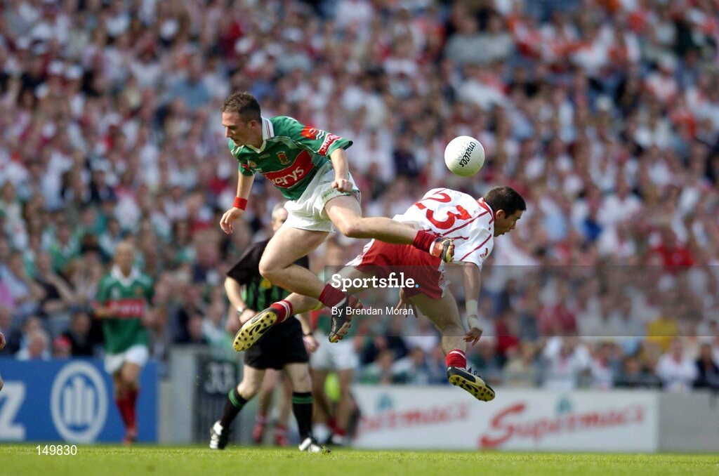 7 August 2004; Ciaran Gourley, Tyrone, in action against Alan Dillon, Mayo. Bank of Ireland All-Ireland Senior Football Championship Quarter Final, Mayo v Tyrone, Croke Park, Dublin. Picture credit; Brendan Moran / SPORTSFILE
