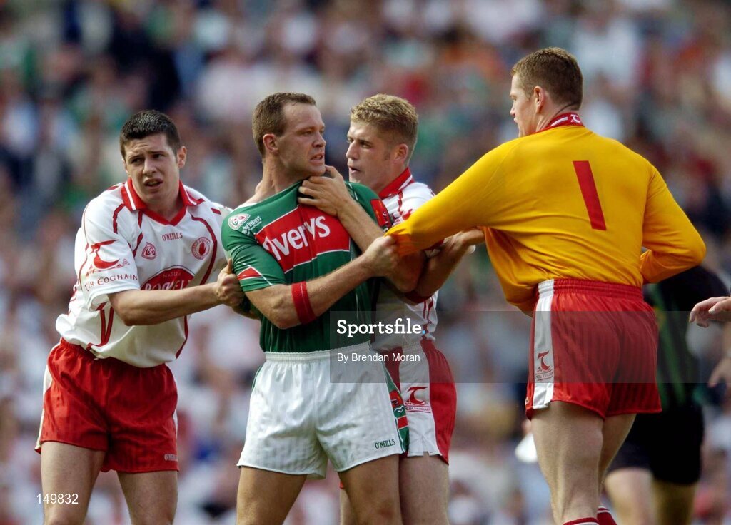7 August 2004; David Brady, Mayo, in an altercation with Sean Cavanagh, left, Kevin Hughes and goalkeeper Pascal McConnell, Tyrone. Bank of Ireland All-Ireland Senior Football Championship Quarter Final, Mayo v Tyrone, Croke Park, Dublin. Picture credit; Brendan Moran / SPORTSFILE