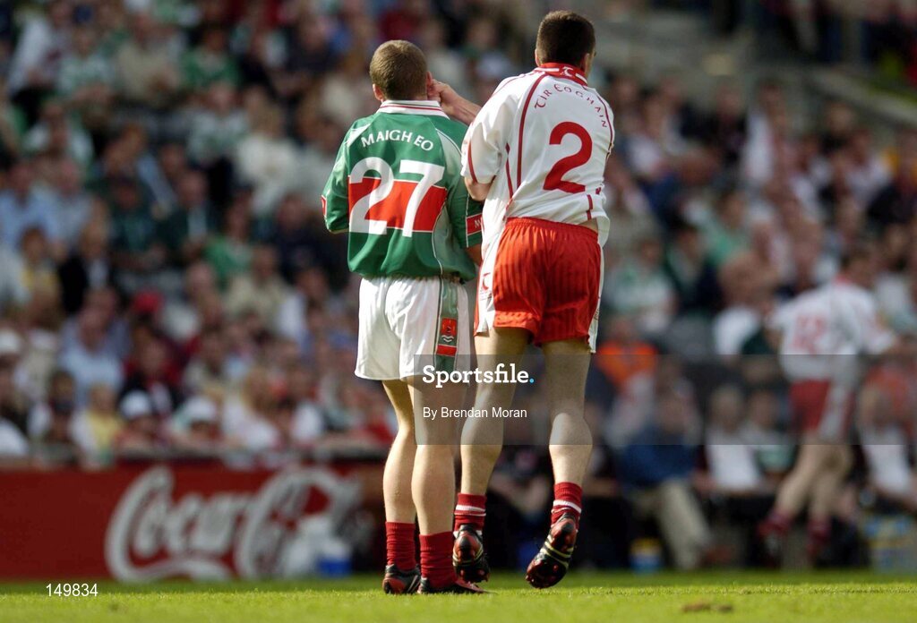 7 August 2004; Ryan McMenamin (2), Tyrone, gets involved with Mayo's Andy Moran for which McMenamin was shown a yellow card. Bank of Ireland All-Ireland Senior Football Championship Quarter Final, Mayo v Tyrone, Croke Park, Dublin. Picture credit; Brendan Moran / SPORTSFILE