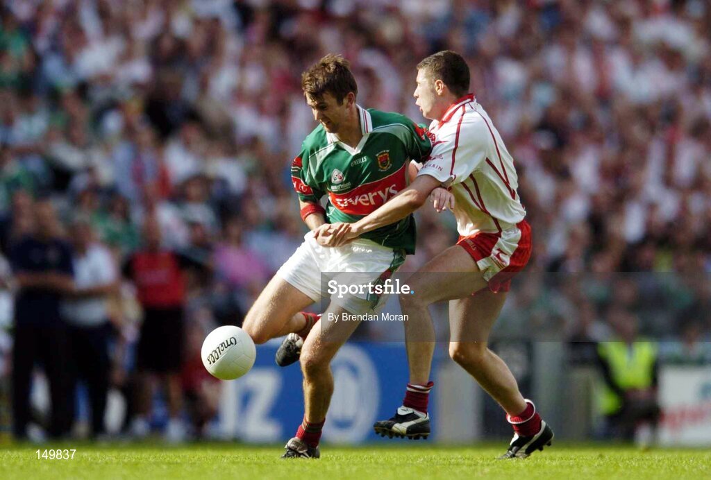 7 August 2004; Ronan McGarrity, Mayo, in action against Sean Canavagh, Tyrone. Bank of Ireland All-Ireland Senior Football Championship Quarter Final, Mayo v Tyrone, Croke Park, Dublin. Picture credit; Brendan Moran / SPORTSFILE