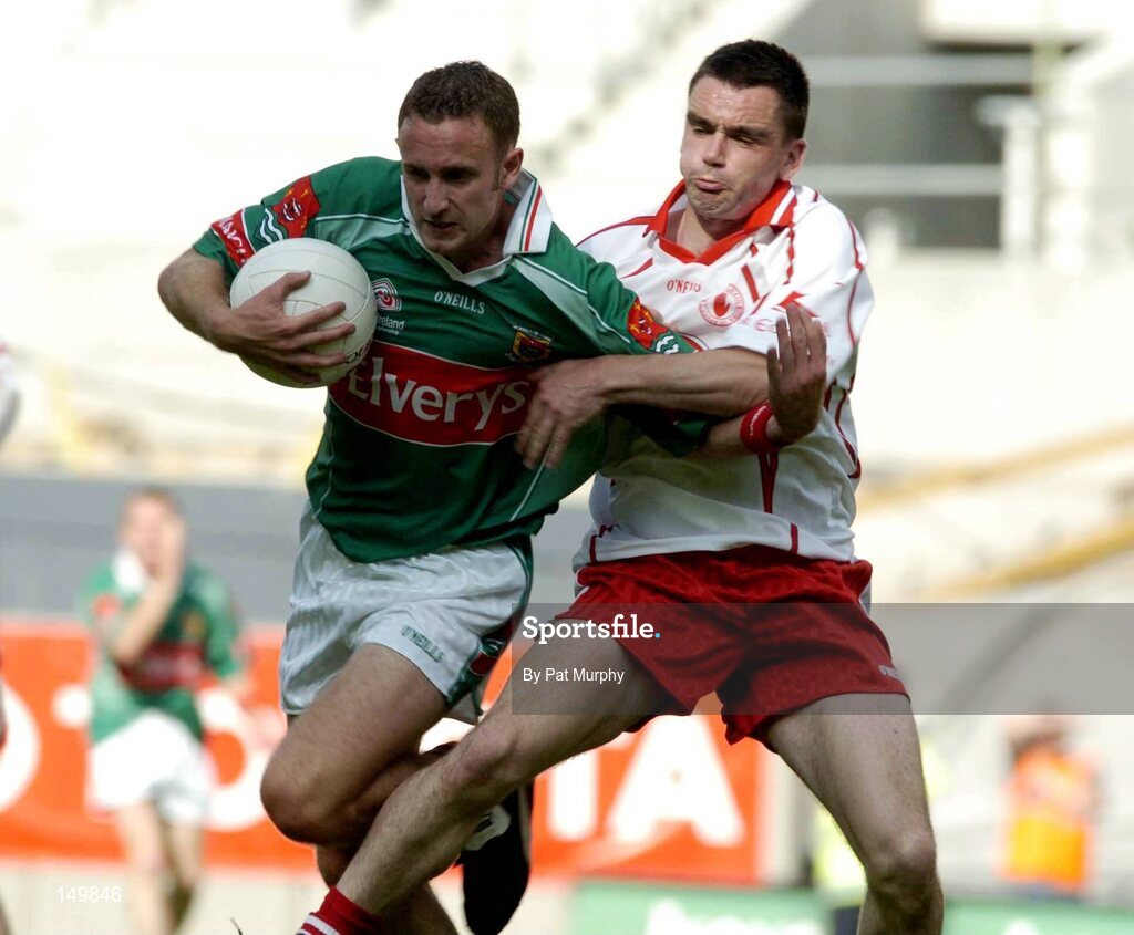 7 August 2004; Pat Kelly, Mayo, in action against Ryan McMenamin, Tyrone. Bank of Ireland All-Ireland Senior Football Championship Quarter Final, Mayo v Tyrone, Croke Park, Dublin. Picture credit; Pat Murphy / SPORTSFILE