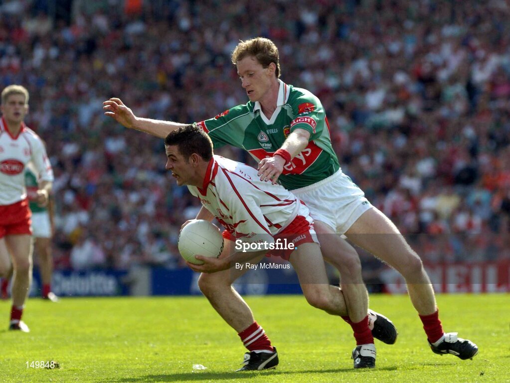 7 August 2004; James Nallen, Mayo, tackles Michael McGee, Tyrone. Bank of Ireland All-Ireland Senior Football Championship Quarter Final, Mayo v Tyrone, Croke Park, Dublin. Picture credit; Ray McManus / SPORTSFILE