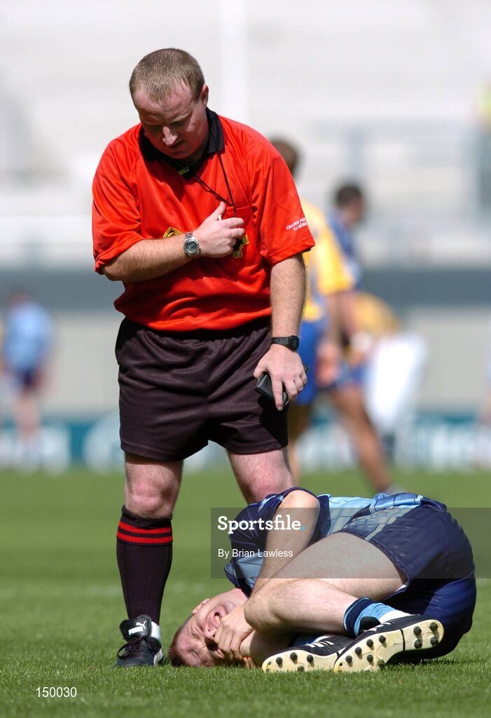 1 August 2004; Referee John Geaney checks on an injured Dessie Farrell, Dublin. Bank of Ireland All-Ireland Football Championship, Round 4, Dublin v Roscommon, Croke Park, Dublin. Picture credit; Brian Lawless / SPORTSFILE
