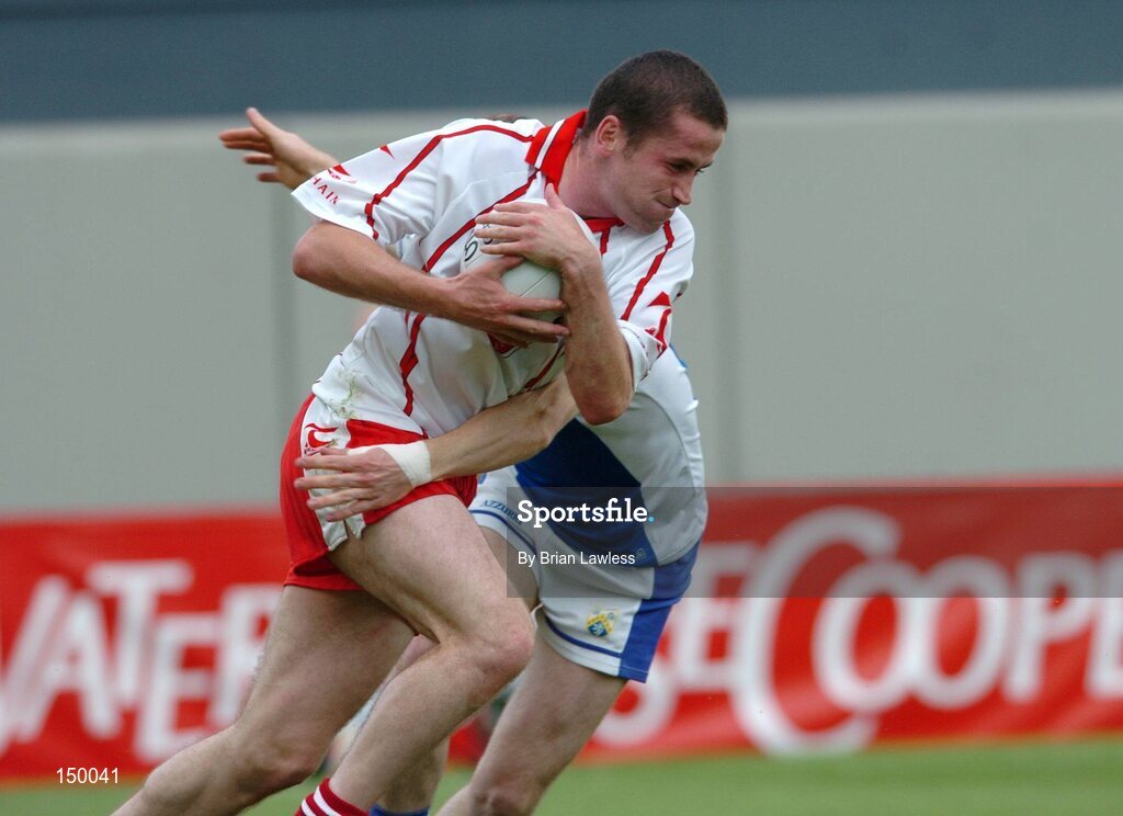 1 August 2004; Stephen O'Neill, Tyrone, in action against Patrick Conway, Laois. Bank of Ireland All-Ireland Football Championship, Round 4, Laois v Tyrone, Croke Park, Dublin. Picture credit; Brian Lawless / SPORTSFILE