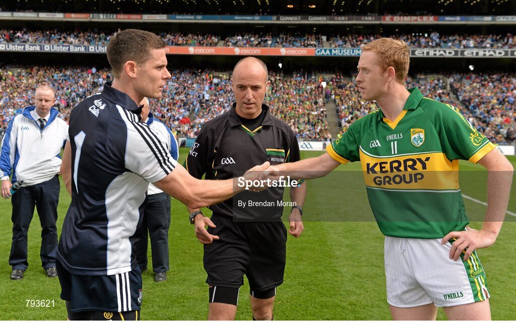 1 September 2013; Team captains Stephen Cluxton, Dublin, and Colm Cooper, Kerry, shake hands, in the company of referee Cormac Reilly, before the game. GAA Football All-Ireland Senior Championship, Semi-Final, Dublin v Kerry, Croke Park, Dublin. Picture credit: Brendan Moran / SPORTSFILE