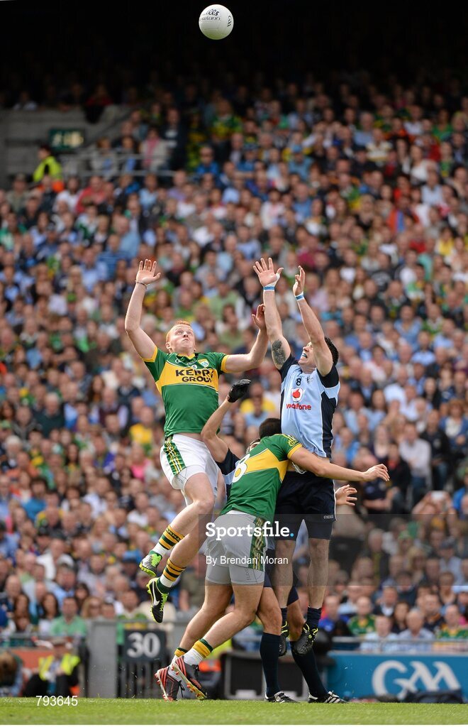 1 September 2013; Johnny Buckley and Anthony Maher, Kerry, contest a high ball with Michael Darragh MacAuley, Dublin. GAA Football All-Ireland Senior Championship, Semi-Final, Dublin v Kerry, Croke Park, Dublin. Picture credit: Brendan Moran / SPORTSFILE