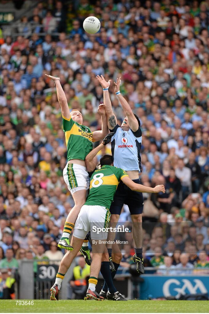 1 September 2013; Johnny Buckley and Anthony Maher, Kerry, contest a high ball with Michael Darragh MacAuley, Dublin. GAA Football All-Ireland Senior Championship, Semi-Final, Dublin v Kerry, Croke Park, Dublin. Picture credit: Brendan Moran / SPORTSFILE